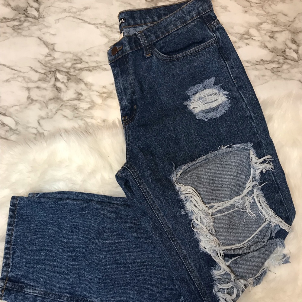 Distressed mid rise jeans